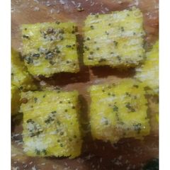 A picture of Khaman Dhokla (in oven).