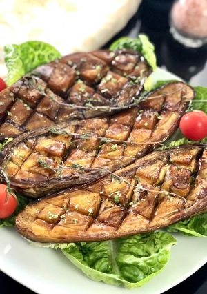 Une photo de Aubergines caramélisées