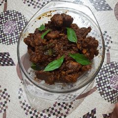 A picture of Mutton Ghee Roast.