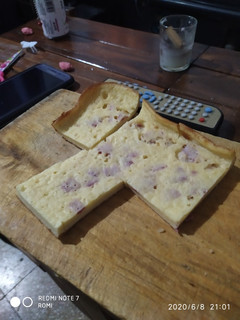 Una foto de Fainá de queso y salame
