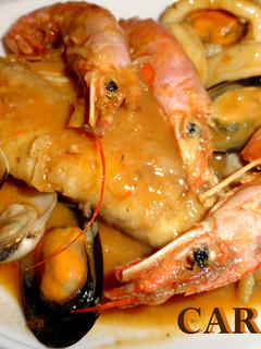 Una foto de Suquet de rape con marisco