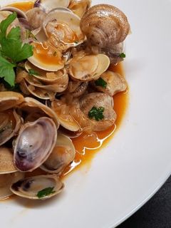 Una foto de Almejas a la Marinera