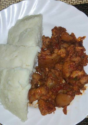 A picture of Pork with Ugali.