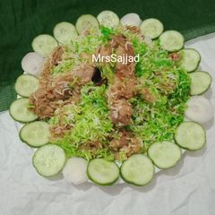 A picture of Haryali Chicken Biryani.