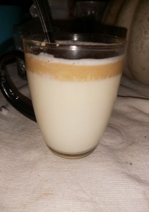 Una foto de Leche con café batido