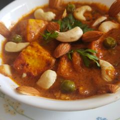 A picture of Paneer matar in kaju badam gravy.
