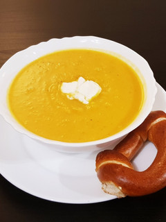 A picture of Butternut squash and goat cheese soup.