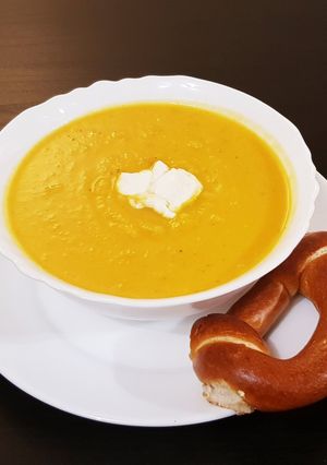 A picture of Butternut squash and goat cheese soup.