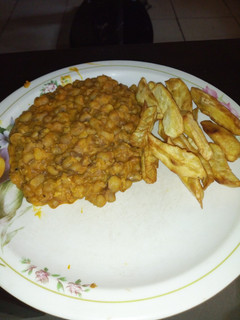 A picture of Beans and fried sweet potatoes.