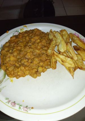 A picture of Beans and fried sweet potatoes.