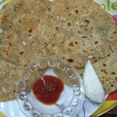 A picture of Fresh Coconut Paratha.