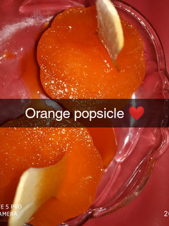 A picture of Orange popsicle sticks.