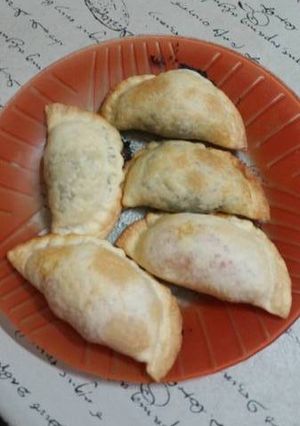 Una foto de Empanadas de queso y cebolla