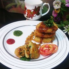 A picture of Lentils Stuffed Crispy Poha Cutlets.