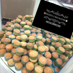 A picture of 100 PCs vanilla cup cakes.