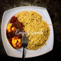 Palm oil sauce with indomie A picture of Palm oil sauce with indomie.