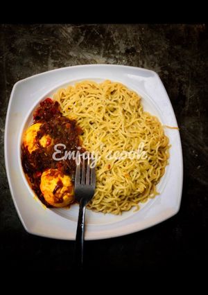 A picture of Palm oil sauce with indomie.