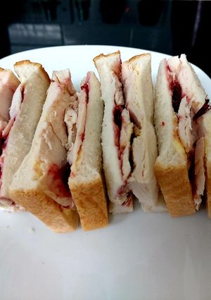 A picture of My Leftover Turkey Sandwich with Cranberry Sauce 😋.