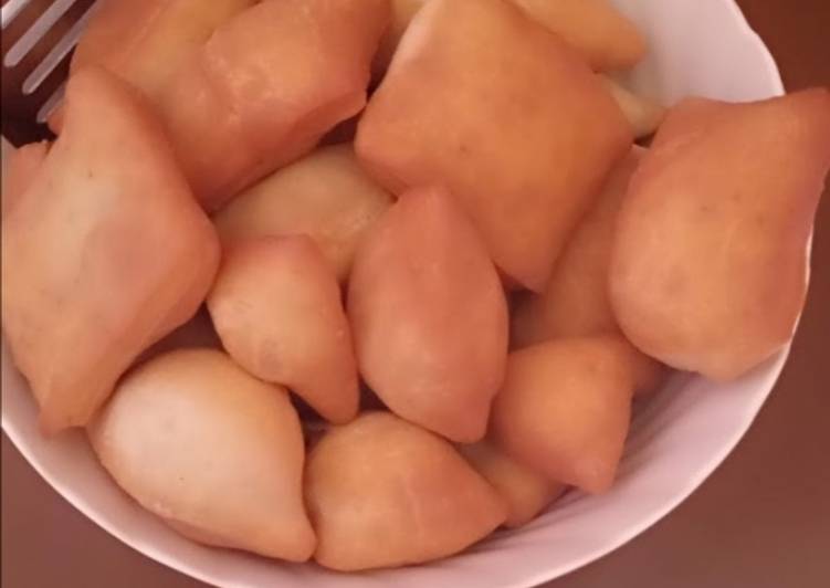 Step-by-Step Guide to Prepare Ginger mandazi very sweet