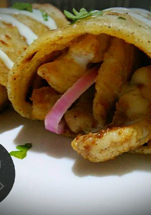 A picture of Chicken roll paratha with garlic mayo sauce.