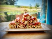 Una foto de canelones de surimi