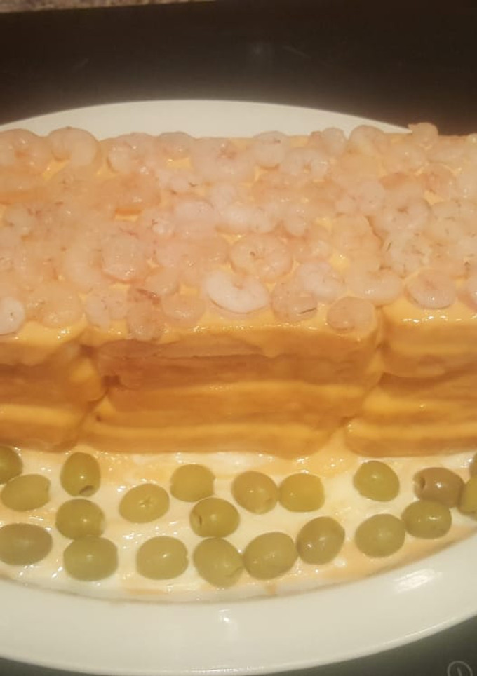 Una foto de Pastel de atún, gambas y aceitunas