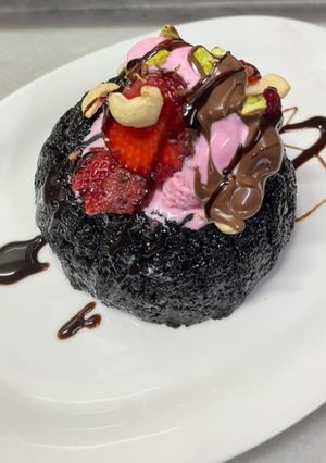 A picture of Chocolate🍫 Nutella Semolina Halwa with Ice - Cream 🍦.