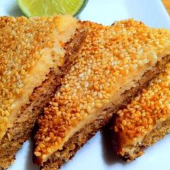 A picture of Golden fried sesame chilli toast.