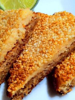 A picture of Golden fried sesame chilli toast.