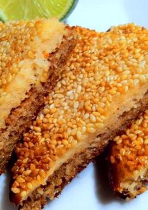 A picture of Golden fried sesame chilli toast.