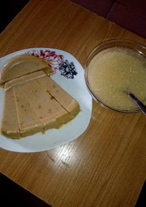 A picture of Palm oil Moi moi and Garri.