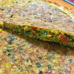 A picture of Iranian colorful vegetables Omelet.