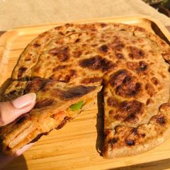 A picture of Pizza Paratha.