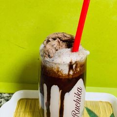 A picture of Kitkat and ice cream milkshake.