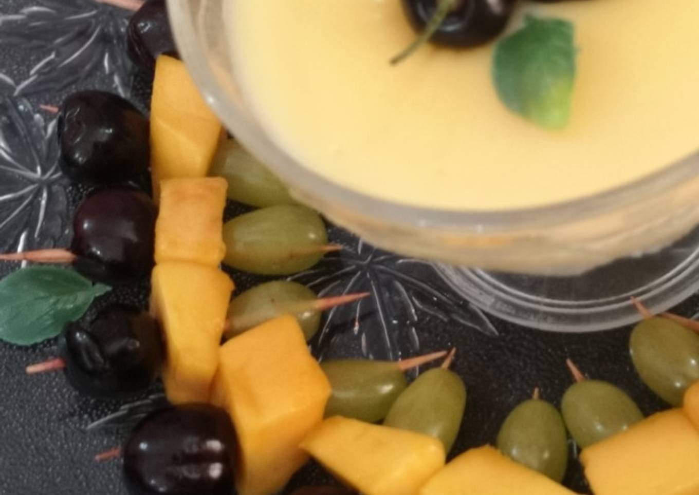 Triple colour fruit skewers with mango custard