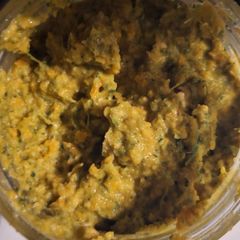 A picture of Oatmeal porridge with celery and carrots.