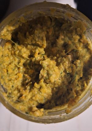 A picture of Oatmeal porridge with celery and carrots.