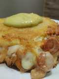 Arepa rellena de salchicha, pimentón, cebolla y queso🥯🌭🧀