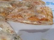 Una foto de pizza con paleta