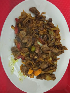 Una foto de Mollejas (Pedres) salteados con curry