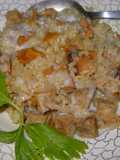 Cerdo cocinado en tajine con leche de coco y arroz