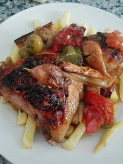Una foto de Muslos de pollo estilo la gita
