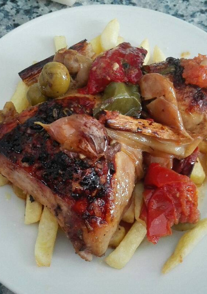 Una foto de Muslos de pollo estilo la gita