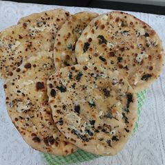 A picture of Butter garlic naan.