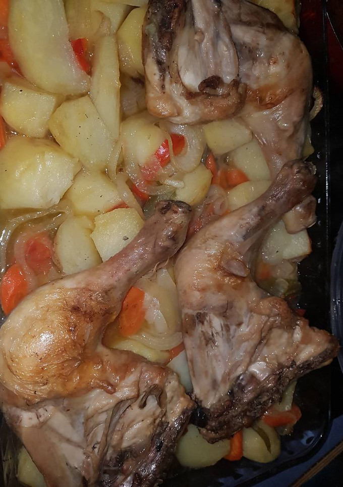 Una foto de Muslos de pollo al horno