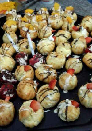 Una foto de Bombita rellenas con crema y dulce