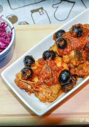Foto di Sovracosce di pollo in umido con insalata di cavolo all'arancia