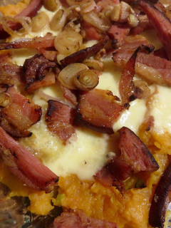 Une photo de Gratin de patate douce aux lard et au fromage