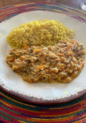 Una foto de Guiso exótico de pollo y zanahorias