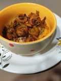 Punjabi bitter gourd rounds in tomato gravy